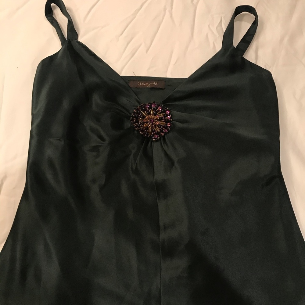 Silk dark green shirt with brooch